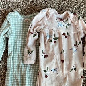 Two preemie outfits.